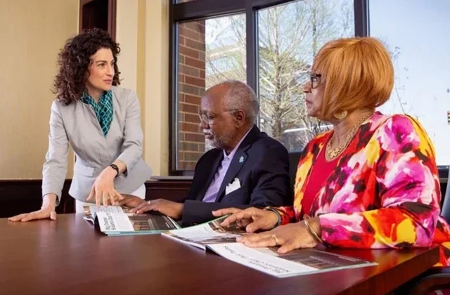 President & CEO Trisha Finnegan discusses meeting community needs with donors Oscar and Shirley Jackson